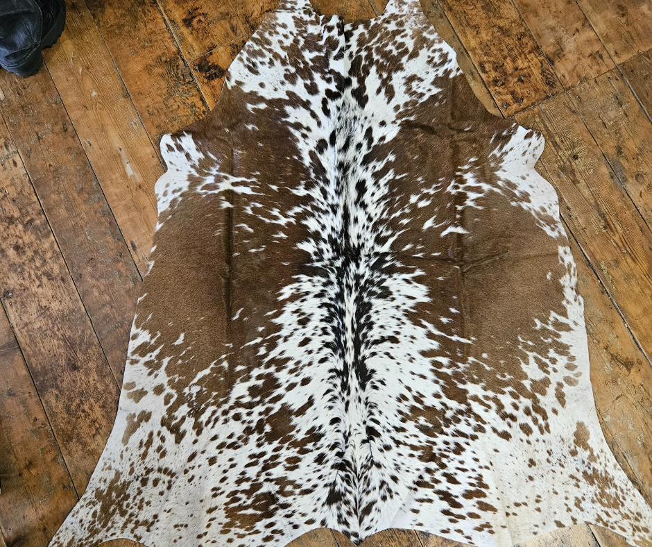 Brown and White Cowhide Rug