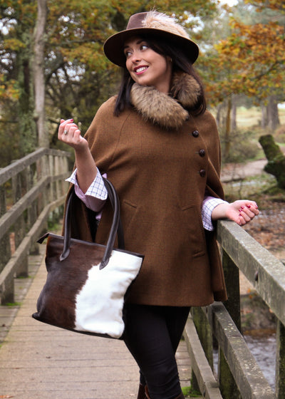 Emma in a stunning tweed cape with the upton handbag brown