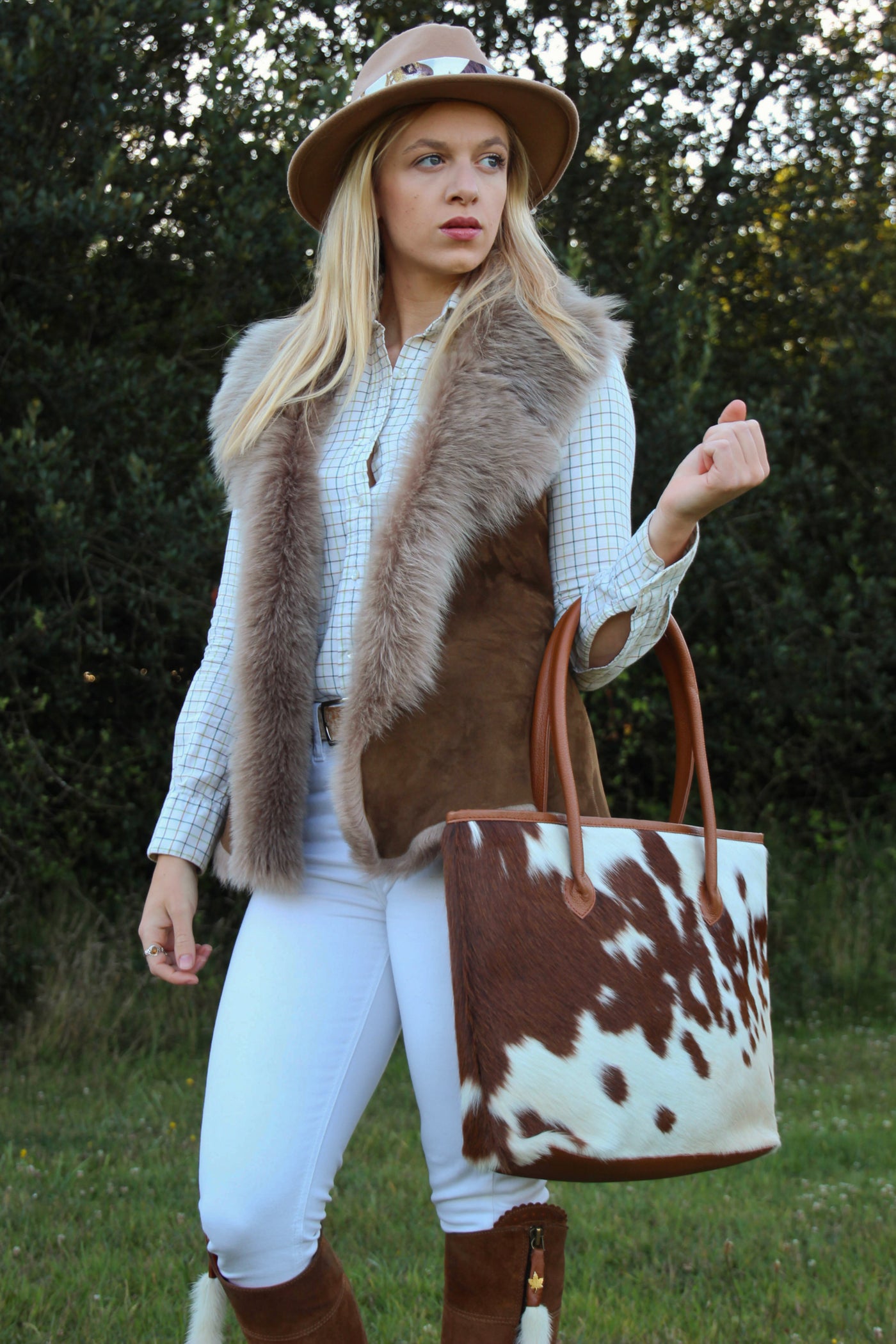 Bethany wears the Ava Toscana Sheepskin Gilet & Tan Upton Cowhide Handbag